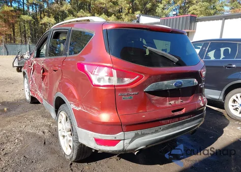 2014 Ford Escape Titanium z USA, uszkodzony, nr VIN 1FMCU9JX7EUA57261